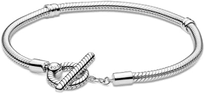 Sterling 925 silver charm bracelet with t pandora snake chain.. Discover the convenience of DIAYTAR NIGERIA's vast product range delivered affordably in 5-8 days.