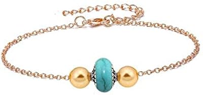 Women's bracelet form gold plated chain dotted with turquoise and golden pearls.. Nigeria's favorite online shopping platform, DIAYTAR offers unbeatable prices and delivery within a week.