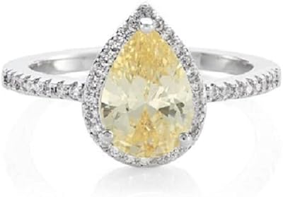 Buckley London ring for women with sparkling pear pattern, silver/yellow, metal, cubic zirconies.. DIAYTAR NIGERIA: Your gateway to affordable shopping with thousands of products delivered nationwide.