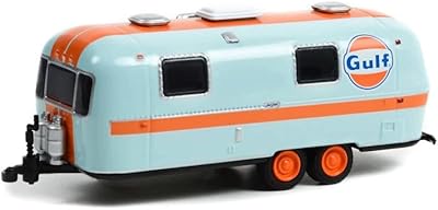 TOY CARS 1971 Travel trailer Land Yacht Safari with double axle, light blue/orange - light green 34120B - Vehicle molded under 1/64 scale.. Shop smart with DIAYTAR NIGERIA, offering a vast product range delivered to your doorstep within a week.