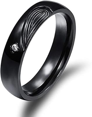 A engagement ring for men and women with black and golden zirconic pearls.. Experience the ease of modern shopping with DIAYTAR NIGERIA's diverse marketplace delivered promptly.