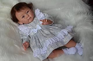 Kokomandy Beautiful realistic dolls for toddians girl 23 inches 58 cm soft body blue eyes rooted curled hair resembling a weighted baby doll realistic hand gifts for children toy.. DIAYTAR NIGERIA makes quality accessible to all with our affordable prices and quick delivery service.