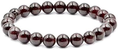 Extensible bracelet in natural precious stones with white red garnet and 8 mm reiki stone.. Fast delivery is our promise — DIAYTAR Nigeria keeps it real.
