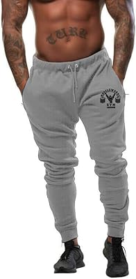 Jogging pants for men's zipper run relaxed sport.. Shopping made simple with DIAYTAR NIGERIA's vast selection and budget-friendly nationwide delivery.