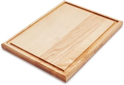 Reversible cutting board on the table, 16 "x 12", maple.. Shop confidently with DIAYTAR NIGERIA's vast product range and budget-friendly nationwide shipping.