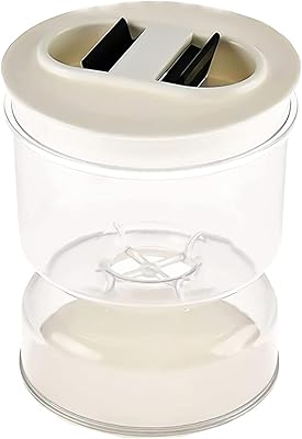 Cornable pot, chest pot in the shape of a faono hourglass for pickles for damp and dry juice, food container with tank and hermetic folding lid.. Your digital shopping companion, DIAYTAR NIGERIA offers exceptional value with delivery in less than 8 days.