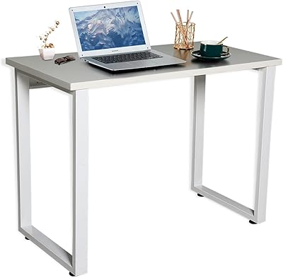 Modern computer desk with Egid, large writing and lasting study desk for home and desk with extra solid feet (white table and white feet tray).. Experience budget-friendly shopping at DIAYTAR NIGERIA, Nigeria's premier online marketplace with quick delivery.