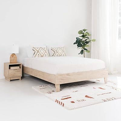 A bed with a distinctive design of Ashley Oliah in wood grain.. Online shopping made simple and affordable — DIAYTAR Nigeria.