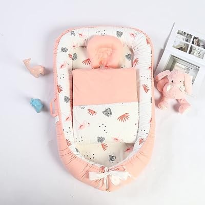 Sleeping bed for newborn in super soft cotton, breathable, washable and portable (pink).. Your everyday shopping destination, DIAYTAR NIGERIA offers quality and value delivered within days.