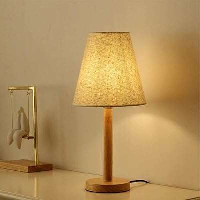 A bedside lamp with a fabric lampshade including LEDs will be published.. DIAYTAR NIGERIA: Where every shopping need is met with affordable prices and timely delivery.