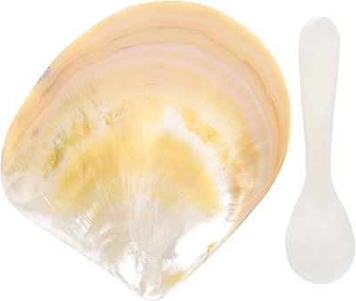 Caviar dish in natural shell: mother -of -pearl with caviar spoon.. DIAYTAR NIGERIA connects you with what you need at prices you'll love, delivered within 8 days.