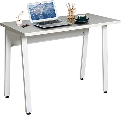 Modern computer desk of Egid, large writing and lasting study office for home, office, school and study with extra solid feet (black and white feet).. Your one-click solution to affordable shopping, DIAYTAR NIGERIA delivers quality products nationwide.