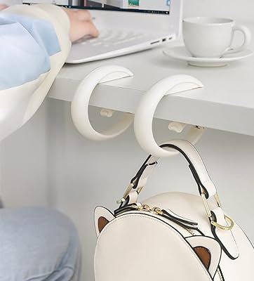 Sweet seven foldable handbag bent for tables - portable office hooks for women's bags - durable ABS material - perfect for cafes, libraries and more.. DIAYTAR NIGERIA: Your trusted partner for affordable online shopping with reliable delivery timeframes.