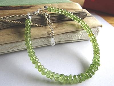 Peridot bracelet, sterling silver bracelet, birth stone for August, stackable bracelet, 2 mm x 3 mm to 2 mm x 5 mm.. DIAYTAR NIGERIA brings the marketplace home to you with affordable prices and delivery in 5-8 days.