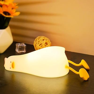 LED tactile light in the shape of a cute night light duck.. Experience the future of online shopping with DIAYTAR NIGERIA's extensive product range and competitive pricing.