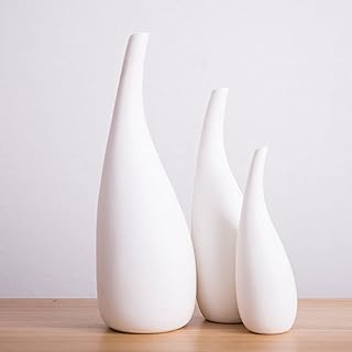 Vases in modern white ceramic, small vases in elegant hand -made pottery porcelain, beautiful floral decoration, perfect for artistic desktop decoration at home, interior decoration vase.. DIAYTAR NIGERIA makes online shopping accessible with our comprehensive platform and prompt delivery service.