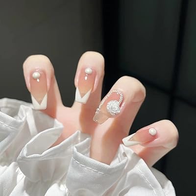 Tipping day long press-on nails 24 pieces of false nails with white pearls with full cover glue for women and girls.. DIAYTAR NIGERIA: Bringing quality products to every Nigerian home at prices everyone can afford.