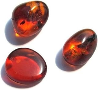 Very small collection of raw amber precious stones by Ian & Valerie, Amber.. Your favorite online marketplace — DIAYTAR Nigeria delivers quick and cheap.