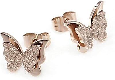 Charming double butterfly earrings in 18 carat surgical steel in pink gold for girls.. Experience shopping freedom with DIAYTAR NIGERIA's comprehensive platform and reliable shipping service.