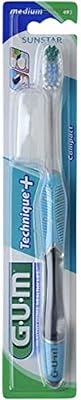 Compact toothbrush GUM Technics with medium hairs - Quadruple handle - Advanced cleaning technology - Effective elimination of the interdental plate - Perfect oral care - Assorted colors.. The best online shopping experience in Nigeria — DIAYTAR delivers it all.