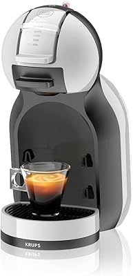 Nescafé Dolce Gusto Mini me, gray/black coffee maker.. DIAYTAR NIGERIA: Where shopping dreams come true with budget-friendly prices and nationwide shipping.