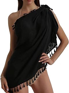 Semi-transparent swimsuit pareo beach for women, mini-skirt with pompoms (black), one size.. DIAYTAR NIGERIA: Where quality meets affordability, with thousands of products delivered in less than 8 days.