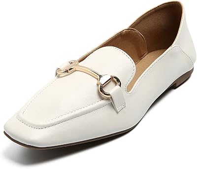 Classic leather moccasins for women, easy to wear and comfortable for driving and office, black and white.. DIAYTAR NIGERIA: Where shopping dreams become reality with budget-friendly prices and prompt delivery.