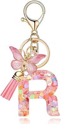 Goodrun alphabet keychain with pompom keychain.. DIAYTAR Nigeria: Shopping that fits your budget and your schedule.