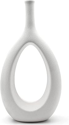 Vase with ceramic flowers ofrank, hollow oval vase for home office decoration, modern geometric vases for the decoration of the dining table of the living room, the bedroom (length (30 cm), white).. Discover the perfect shopping experience with DIAYTAR NIGERIA's vast selection and prompt delivery service.