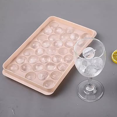 Round ice cube tray with lid, ice ball pan for freezer, small 1 inch round ice cube tray is_best_seller.. Quality and convenience delivered — shop DIAYTAR Nigeria now.