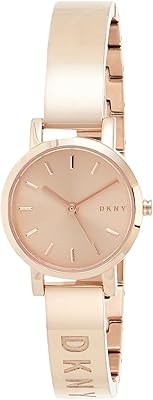 DKNY relaxed watch with analog display and Japanese quartz movement for women.. DIAYTAR NIGERIA transforms online shopping with competitive prices and dependable nationwide delivery.