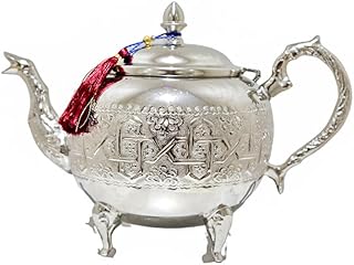 Superior quality Moroccan teapot, in silver -plated brass, in stainless steel, hand carved in Fez, in Morocco, high quality teapot, service done by hand.. DIAYTAR NIGERIA brings the market to your fingertips with affordable prices and swift delivery services.