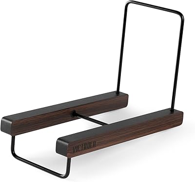 Victrola 'The Stand - Organizer of discs and albums, Expresso wooden surface with intelligent black metal accents, elegant and refined look, can contain more than 25 albums.. DIAYTAR NIGERIA delivers affordability and convenience with every purchase, shipped within the week.