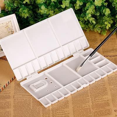Delfino plastic foldable watercolor palette with 33 hole storage compartments for the thumb.. For everyday items and more, trust DIAYTAR Nigeria.
