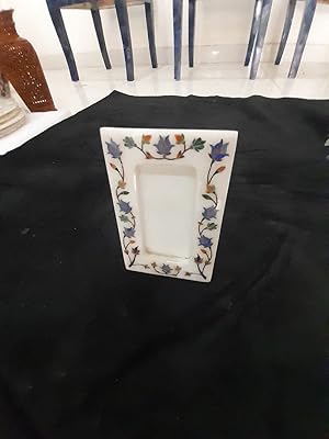 Alazing photo frame in alabaster stone for interior and wall decoration.. Your complete shopping solution, DIAYTAR NIGERIA offers extensive choice with competitive prices and delivery.