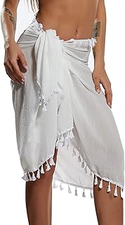 Semi-transparent swimsuit pareo beach for women, mini-skirt with pompoms (white), one size.. DIAYTAR NIGERIA combines affordability, variety, and convenience with nationwide delivery services.
