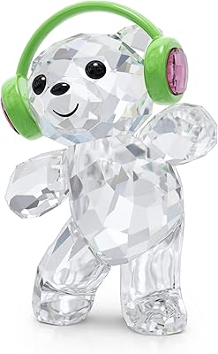 Swarovski Kris Bear Just Dance figurine, Pink and Transparent Swarovski crystals with green metal accents, part of the Kris Swarovski Bear collection.. Experience shopping satisfaction with DIAYTAR NIGERIA's vast selection and nationwide delivery service.
