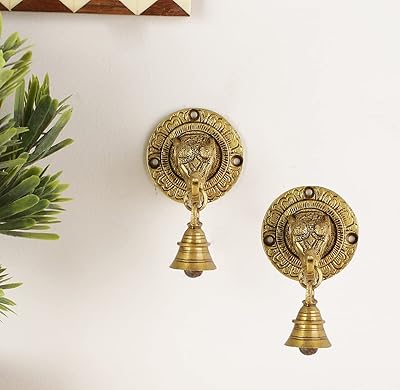 Pair of decorative brass bells with two mustaches for wall and door with elephant face pattern.. DIAYTAR NIGERIA brings the joy of affordable shopping to your fingertips with delivery in less than 8 days.