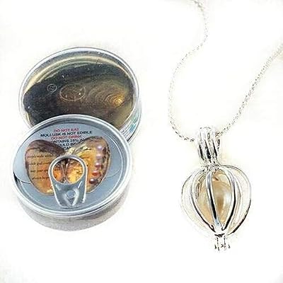 The gift of love is a set of natural pearl oysters (freshwater pearl) with a silver pendant to put the love of love.. DIAYTAR NIGERIA brings the marketplace home to you with affordable prices and delivery in 5-8 days.