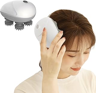 Electric Masseur Scalp Portable masseur with 4 replacement massage heads stress relief.. DIAYTAR NIGERIA transforms online shopping with competitive prices and dependable nationwide delivery.