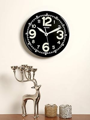 Silent wall clock light rhythm in darkness ¦ 31x45 cm.. DIAYTAR NIGERIA delivers on our promise of extensive selection and budget-friendly nationwide shipping.