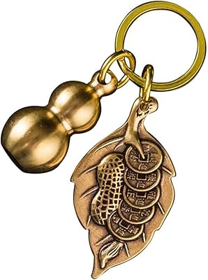 Delfino brass feng shui pumpkin keychain with coins.. DIAYTAR NIGERIA connects Nigerians with quality products at affordable prices, delivered in 5-8 days nationwide.