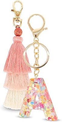 Pompon keychain and 2-piece letter Boho bag woven hand.. Experience the joy of discovery with DIAYTAR NIGERIA's vast catalog and nationwide affordable delivery.