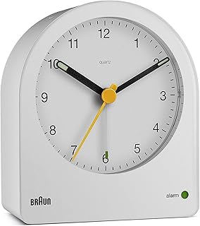 Classic Braun analog awakening with snooze function and continuous backlight, silent quartz movement, crescento sound alarm in white, BC22W model.. DIAYTAR NIGERIA redefines convenience with our diverse marketplace and affordable nationwide shipping.