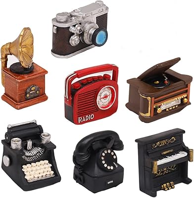 The White Shop is a set of 7 European Creative Resin figurines to decorate the window of coffee and house (includes phones, a typewriter, a camera, a piano, a phonograph, a radio and an audio player).. DIAYTAR NIGERIA redefines convenience with our diverse marketplace and affordable nationwide shipping.
