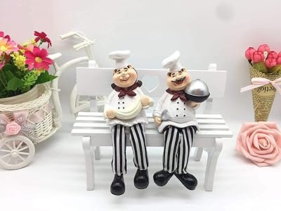Dubai Decor New batch of 2 adorable bistro figurines.. Shop for less and receive more with DIAYTAR NIGERIA's expansive e-commerce platform and nationwide delivery.