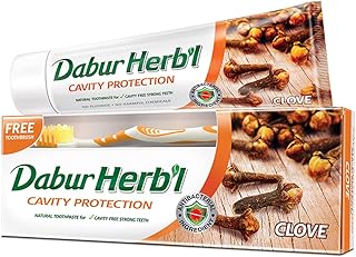 Natural toothpaste with dabur herbs with cloves for cavity protection, without fluoride or harmful chemicals - matching colors / toothbrush - 140 g.. Get top brands at bottom prices, only on DIAYTAR Nigeria.