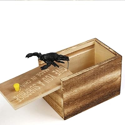 Box of surprise wooden pranks made by hand with a fun and practical design (rubber scorpion box).. Discover endless shopping possibilities at DIAYTAR NIGERIA, with budget-friendly prices and reliable delivery.