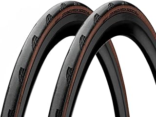 A pair of Foldable Tire Continental Grand Prix 5000 S TR 700x25c Black/Brown Tubeless.. DIAYTAR NIGERIA makes every shopping desire a reality with affordable prices and delivery in 5-8 days.