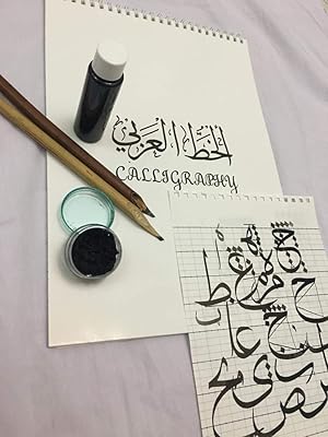 Beginner set of Kalamizzi calligraphy with silk inkwell, A4 pages, ink and 2 bamboo pens with bonus game of 3 pens in bamboo.. Your complete retail destination, DIAYTAR NIGERIA combines extensive variety with prompt delivery.